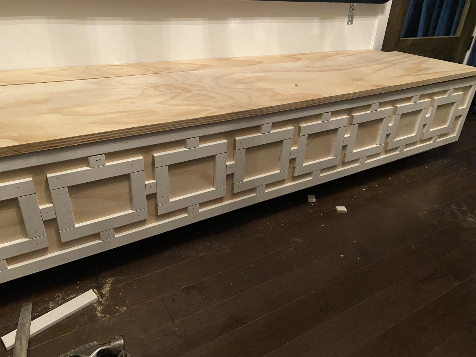 diy storage banquette seat being built